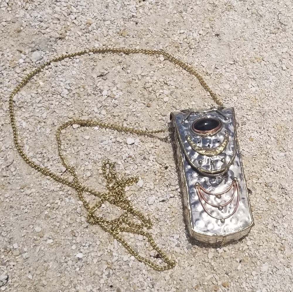Vintage silver tone purse with brass, copper, and onyx stone
